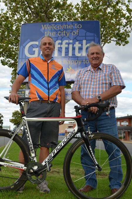 MASTER STROKE: Griffith Cycle Club president Jason Minato and Mayor John Dal Broi celebrate bringing the NSW Masters Road and Criterium Championships to Griffith.
