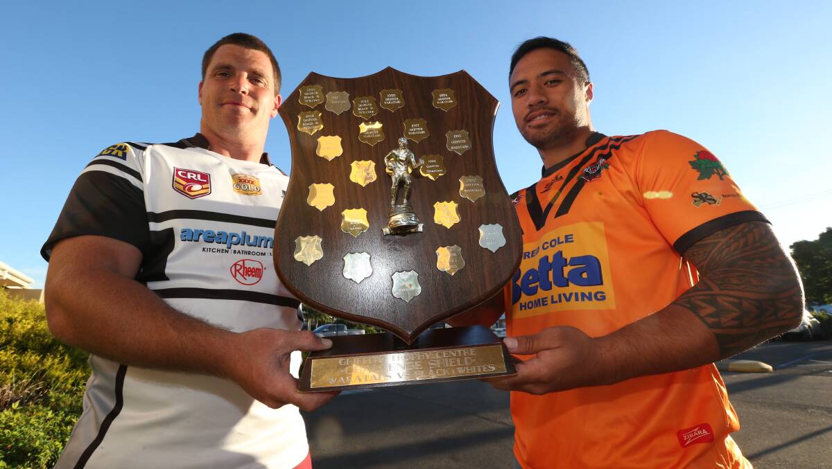 SHOWDOWN: Black and Whites captain-coach David Milne and Waratah Tigers boss Kose Lelei with the Doug Alpen Memorial Shield, which goes up for grabs under lights on Friday night.