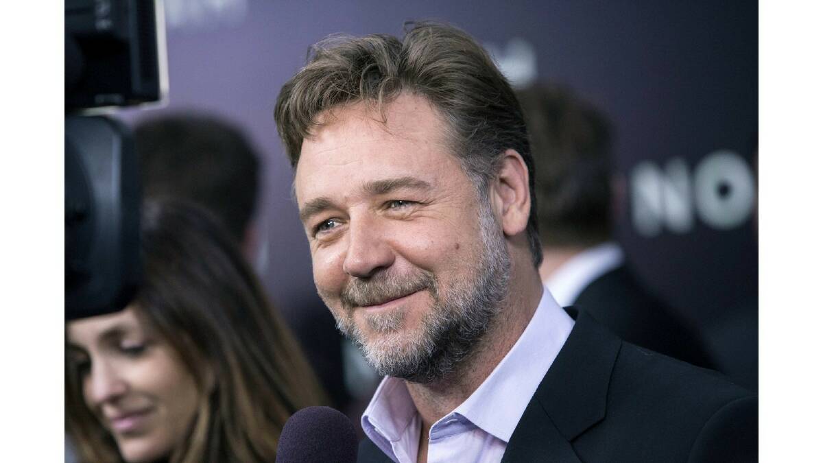 Cast member Russell Crowe speaks to a journalist during the U.S. premiere of "Noah" in New York March 26, 2014. Photo: Reuters.