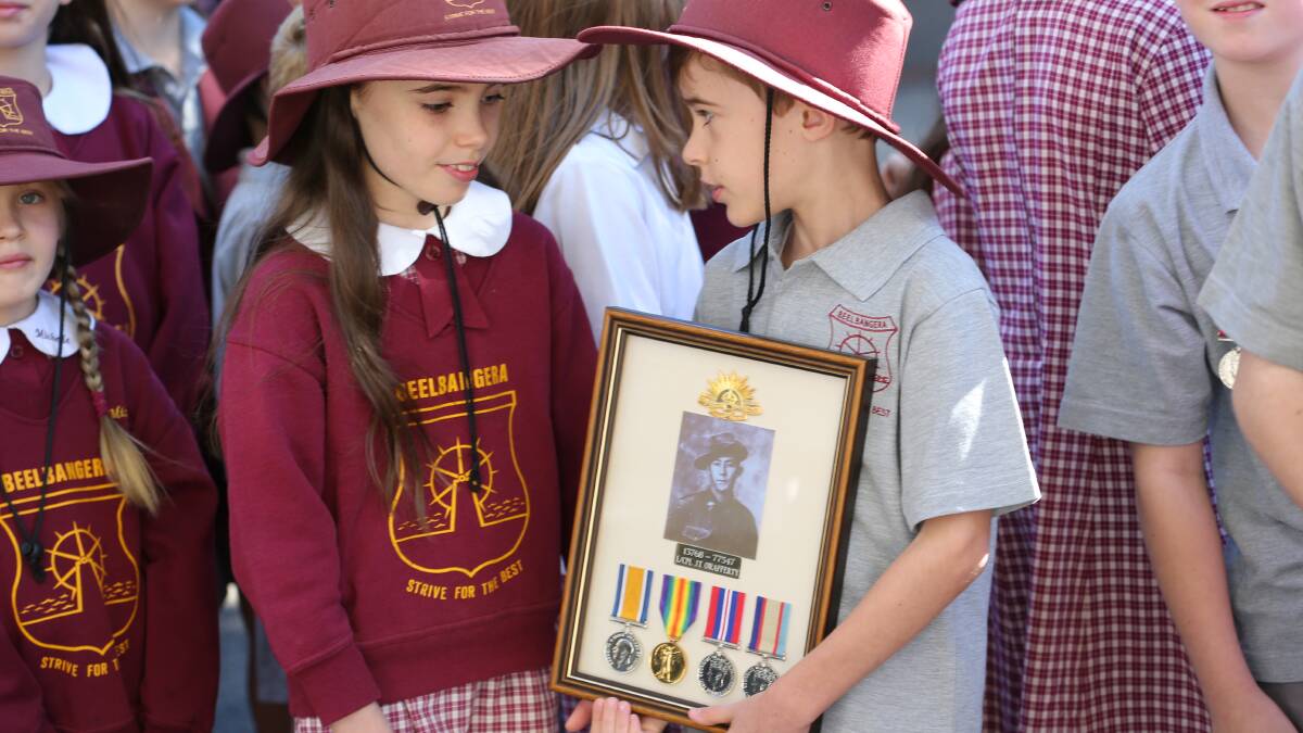 Sarah and Dean Casey show off their great-grandfather's war medals. 