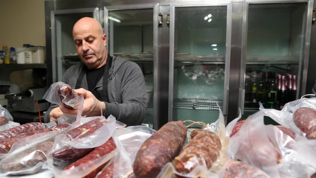 IMPRESSIVE: Nick Nucara and Rina Mercuri survey the salami on offer at Festa Delle Salsicce. Picture: Anthony Stipo