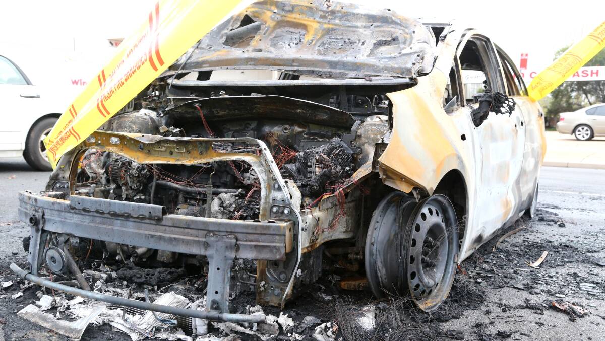 UP IN SMOKE: This torched Kia Rio was among four vehicles set on fire in Griffith on Wednesday morning.