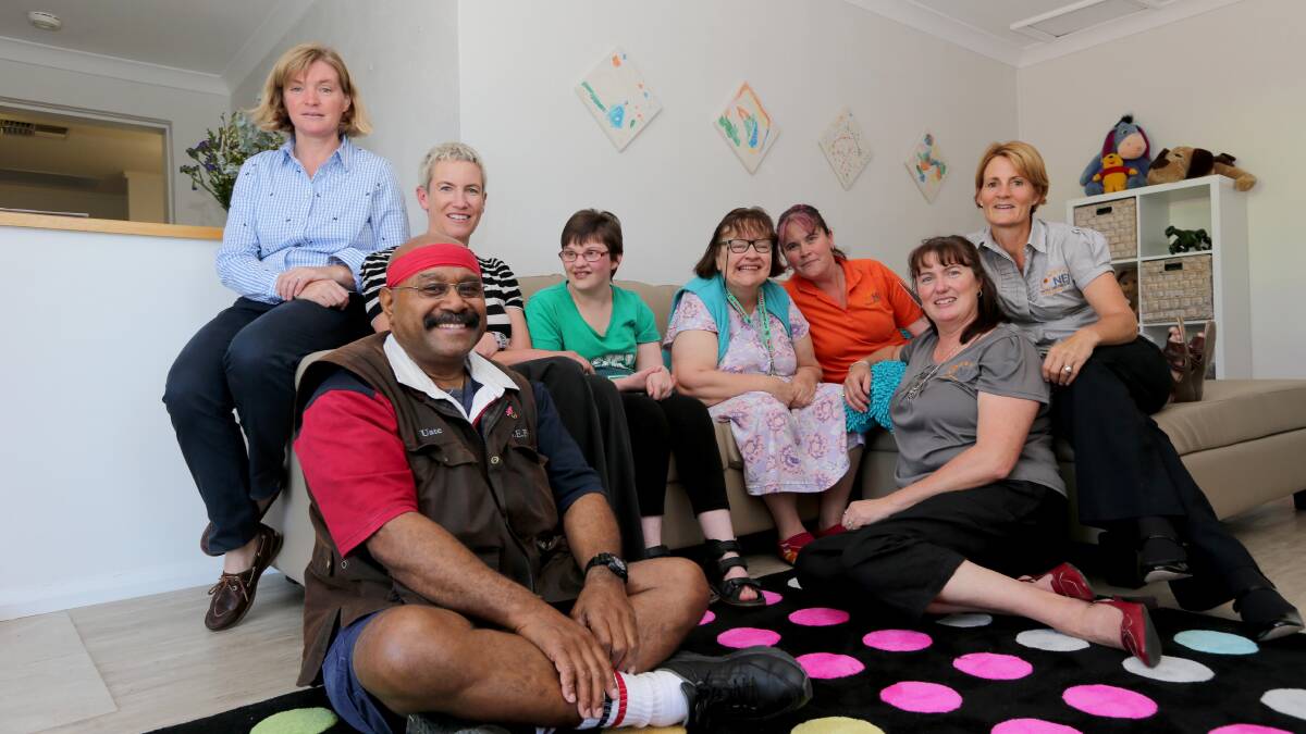 MADE OVER WITH CARE:MADE OVER WITH CARE: (front) UnitingCare volunteer Uate Qasi, (back) UnitingCare volunteer Nicole Dehnert, NEI’s Fiona Durham, client Rachel Gray, client Joanne Conway, NEI’s Tamara McPherson, respite services manager Sonya Perlowski and NEI's Jo Polkinghorne enjoy the revamp thanks to UnitingCare. Picture: Anthony Stipo
