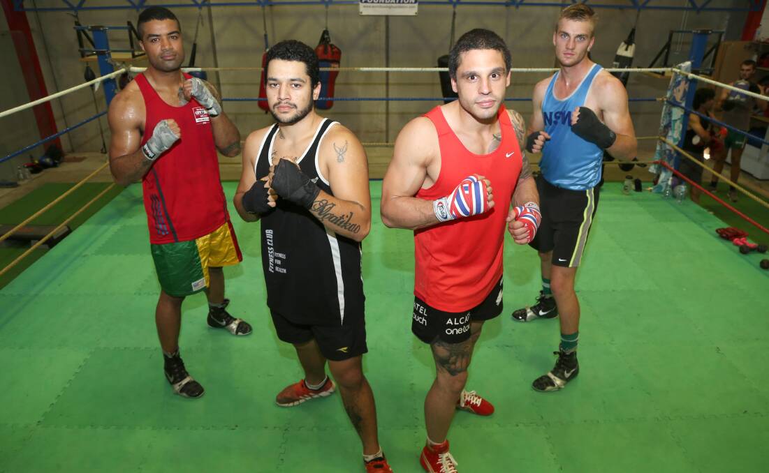 GLOVING UP: (From left) Grifith City Boxing fighters Hiki Loseli, Jadee Ngatikao, Mitch Rossetto and Greg Halden will feature on a fight card in Dubbo on Friday. Picture: Anthony Stipo