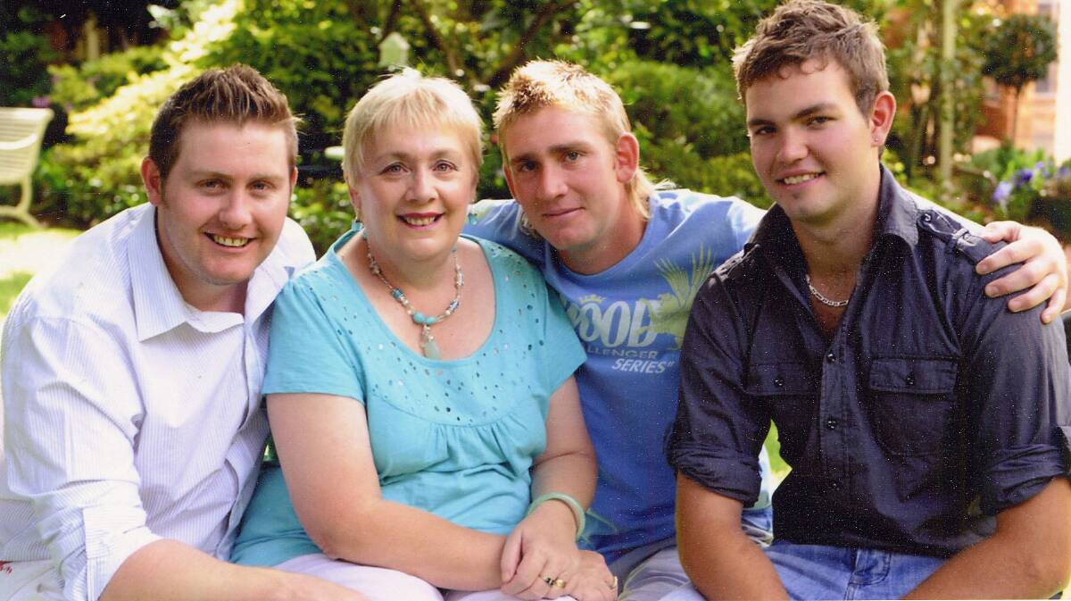 HAPPIER TIMES: The Sweeny siblings and their mother before Mitchell's tragic death - Justin, Wendy, Brendan and Mitchell in 2009. Mitchell died in February 2010, installing foil insulation under the government's rebate program.