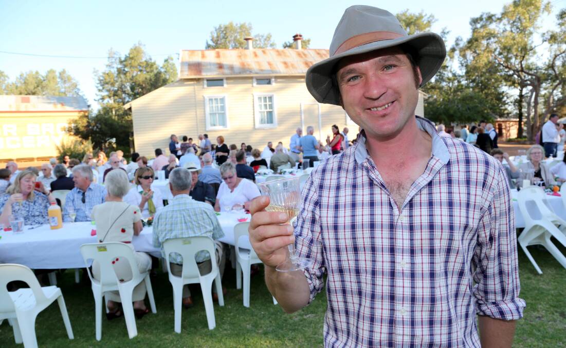 CHEERS: Griffith Festival of Gardens special guest Tino Carnevale toasts to the success of the event during the festival dinner on Saturday night at Pioneer Park. Picture: Anthony Stipo