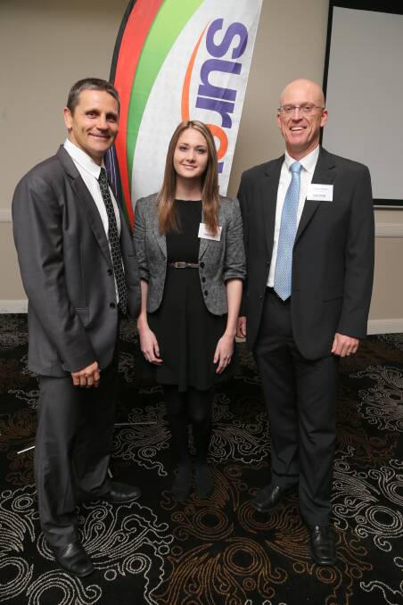 TAKE A CHANCE: Rugby League legend Wayne Pearce, Griffith job seeker Jenna Harris and Sureway's regional manager, Craig Tilston, discuss youth unemployment at the Ex-Servicement's Club yesterday morning. Picture: Anthony Stipo.