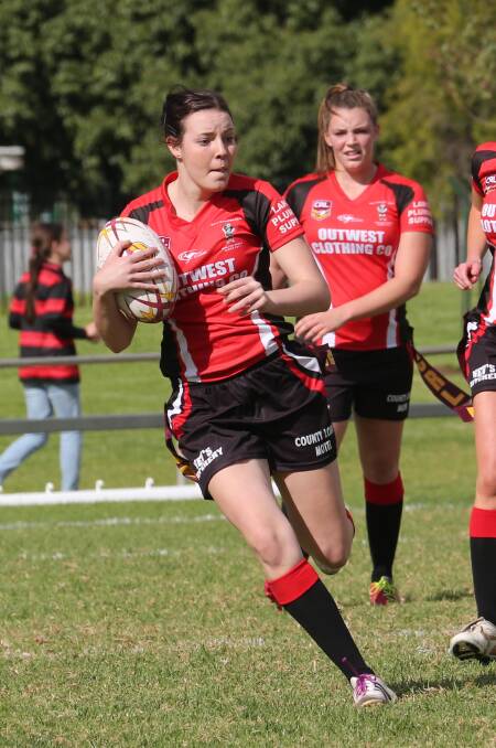 SPACE: West Wyalong league tag player Tasmin Rowe looks to move the ball up the field. Rowe and her teammates will play Leeton in the Group 20 grand final on Sunday.