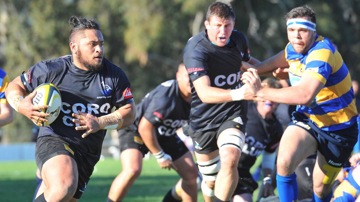 OUT OF MY WAY: Griffith Blacks prop Chris Latu charges up the field in the SIRU grand final.