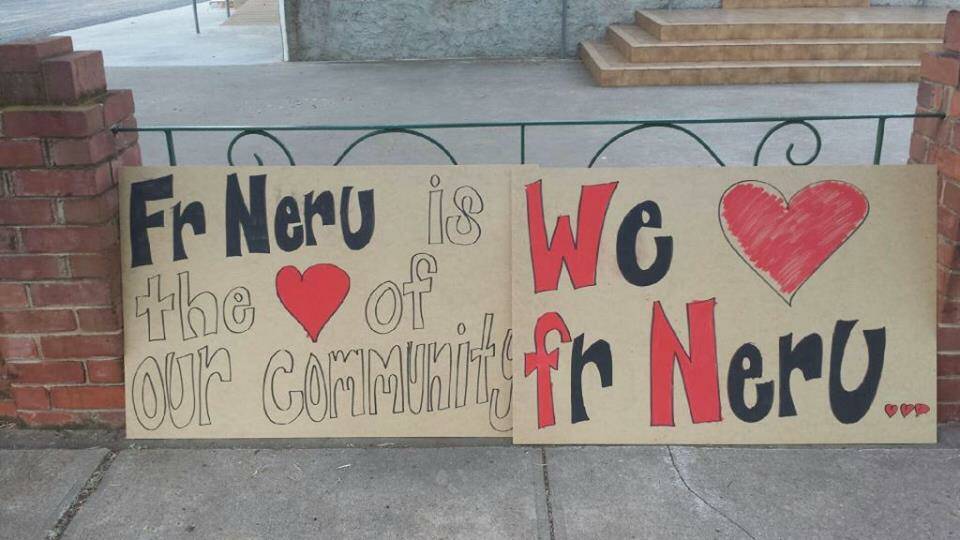 KEEP FATHER NERU: Community members have put up posters to raise their voices.