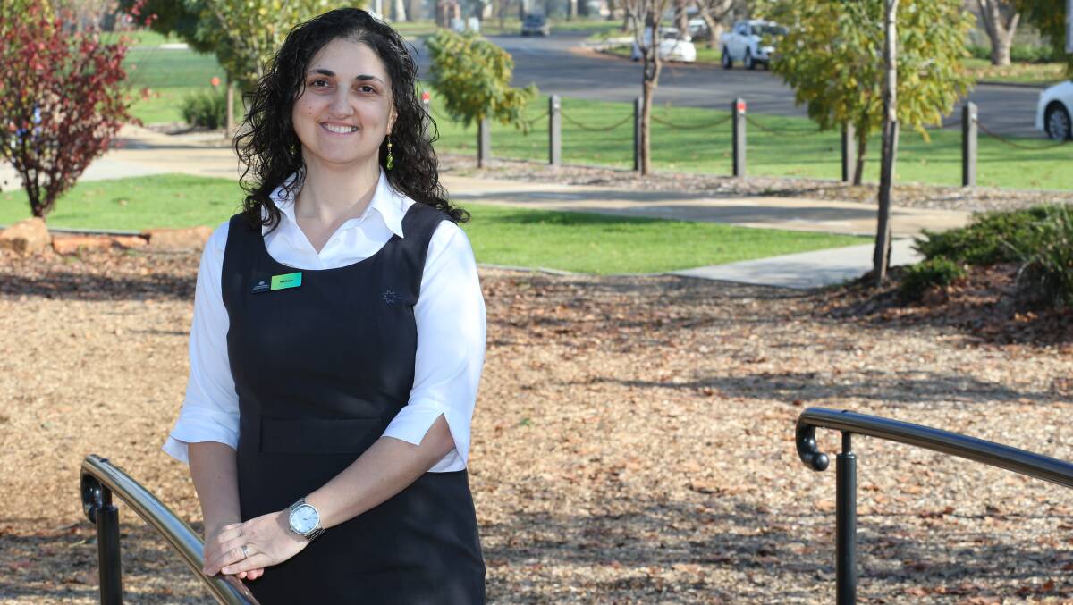 GOING THE EXTRA MILE: Department of Human Services multicultural services officer Marlene Nehme has been recognised for her work with refugees.