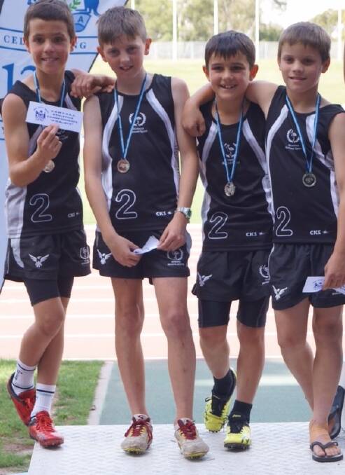 WELL DONE: (From left) Hanwood Public School students Judd Stevenson, Jacob Witherspoon, Heath Crossingham and Oliver Bartter won a relay silver medal at the state athletics carnival.