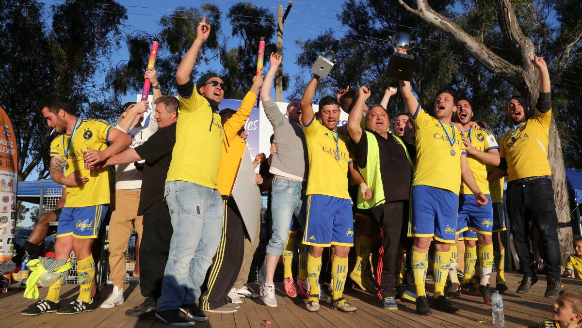 PARTY TIME: Yoogali FC celebrates its Billabong Cup win.