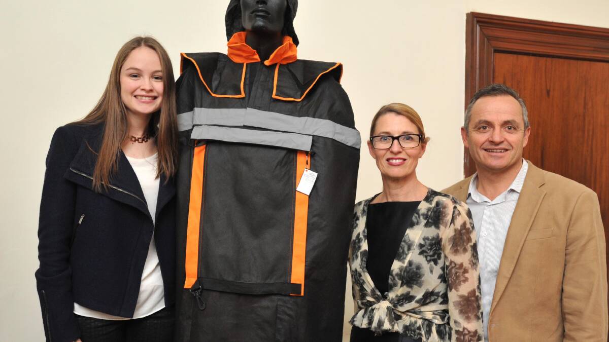 THOUGHTFUL DESIGN: Griffith's Lucy Forlico, who studied at St Vincent's College Potts Point, with her HSC Design and Technology major work - the CapeBag - and her parents, Georgie and Anthony Forlico.