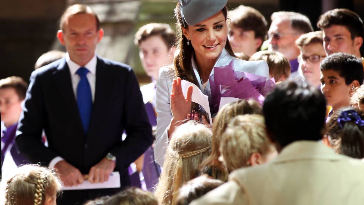  Their Royal Highnesses the Duke and Duchess of Cambridge, Prince William and Duchess Kate attend an Easter Sunday service at St Andrew's Cathedral in Sydney. The Duchess farewells some of the children gathered to say goodbye. Picture: Toby Zerna
