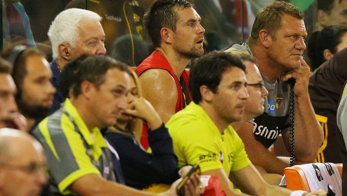 uke Hodge of the Hawks is subbed to the bench during the AFL Round two match between the Essendon Bombers and the Hawthorn Hawks at Etihad Stadium. Picture: Getty