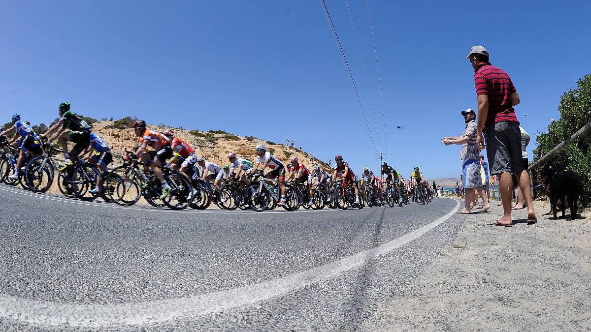 The Peloton wind there way down along the coast during Stage Five of the Tour Down Under. Photo: Getty.