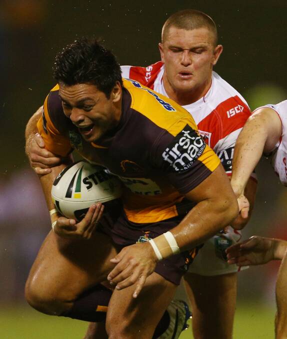 lex Glenn of the Broncos is tackled by Mitch Rein during the round four NRL match. Picture: Getty