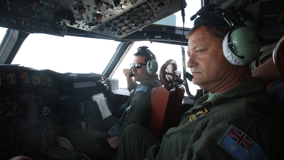 Flt Lieutrnant Adam Francki and Warrant Officer Brenton Bell in the cockpit of a Royal Australian Air Force AP-3C Orion from RAAF base Pearce on assignment to Southern Indian Ocean to commence a search for possible debris from the Malaysian Airlines flight MH370 on March 24. Picture: Getty