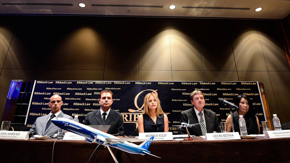 Representatives from Ribbeck Law Chartered listen to a question from the reporters during a press conference on March 26, 2014 in Kuala Lumpur, Malaysia. Ribbeck Law Chartered, The largest aviaton law in the world announced that the families of the passengers Malaysian Airliner MH370 have initiated a multimillion dollar ligitation process against the Boeing Company and Malaysia Airlines. Picture: Getty