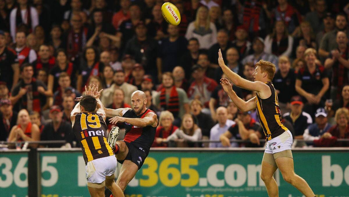 Paul Chapman of the Bombers kicks a goal during the AFL Round two match between the Essendon Bombers and the Hawthorn Hawks at Etihad Stadium. Picture: Getty