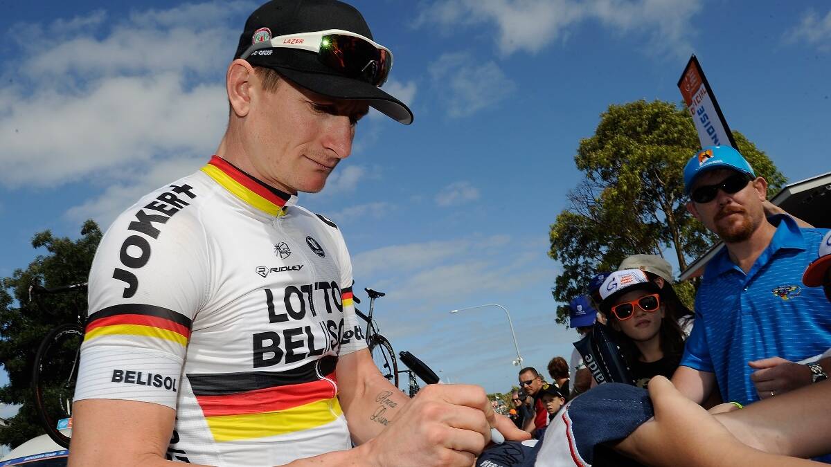 German rider Andre Greipel from team Lotto Belisol signs autographs at the start of Stage Five of the Tour Down Under. Photo: Getty.