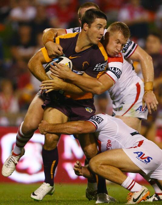 Ben Hunt of the Broncos is tackled by the Dragons defence during the round four NRL match between the St George Illawarra Dragons and the Brisbane Broncos at WIN Stadium. Picture: Getty