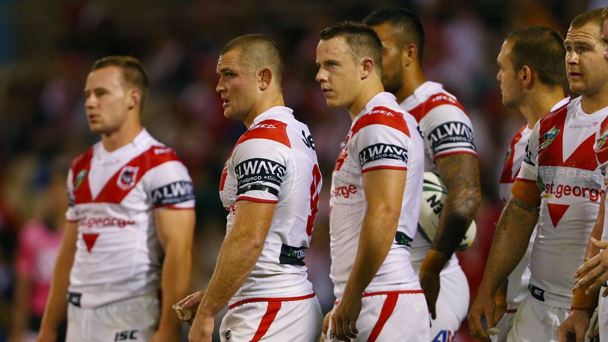 Dejected Dragons players Mitch Rein and Sam Williams during the round four NRL match between the St George Illawarra Dragons and the Brisbane Broncos at WIN Stadium. Picture: Getty