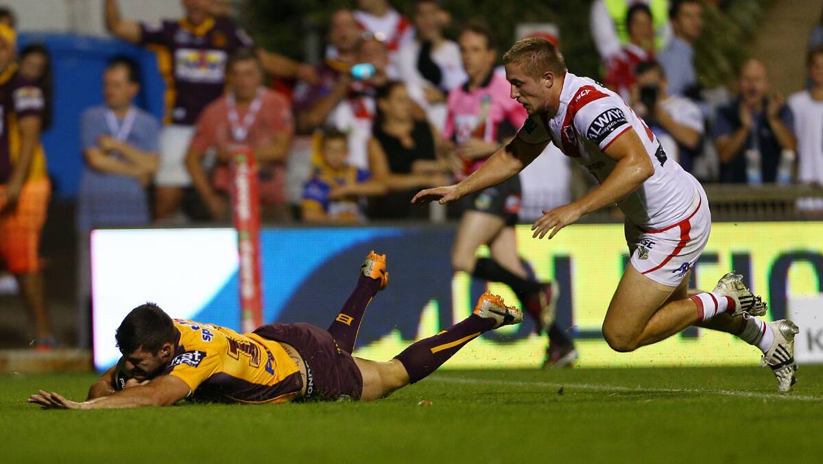 Matt Gillett of the Broncos scores a try during the round four NRL match between the St George Illawarra Dragons and the Brisbane Broncos at WIN Stadium. Picture: Getty