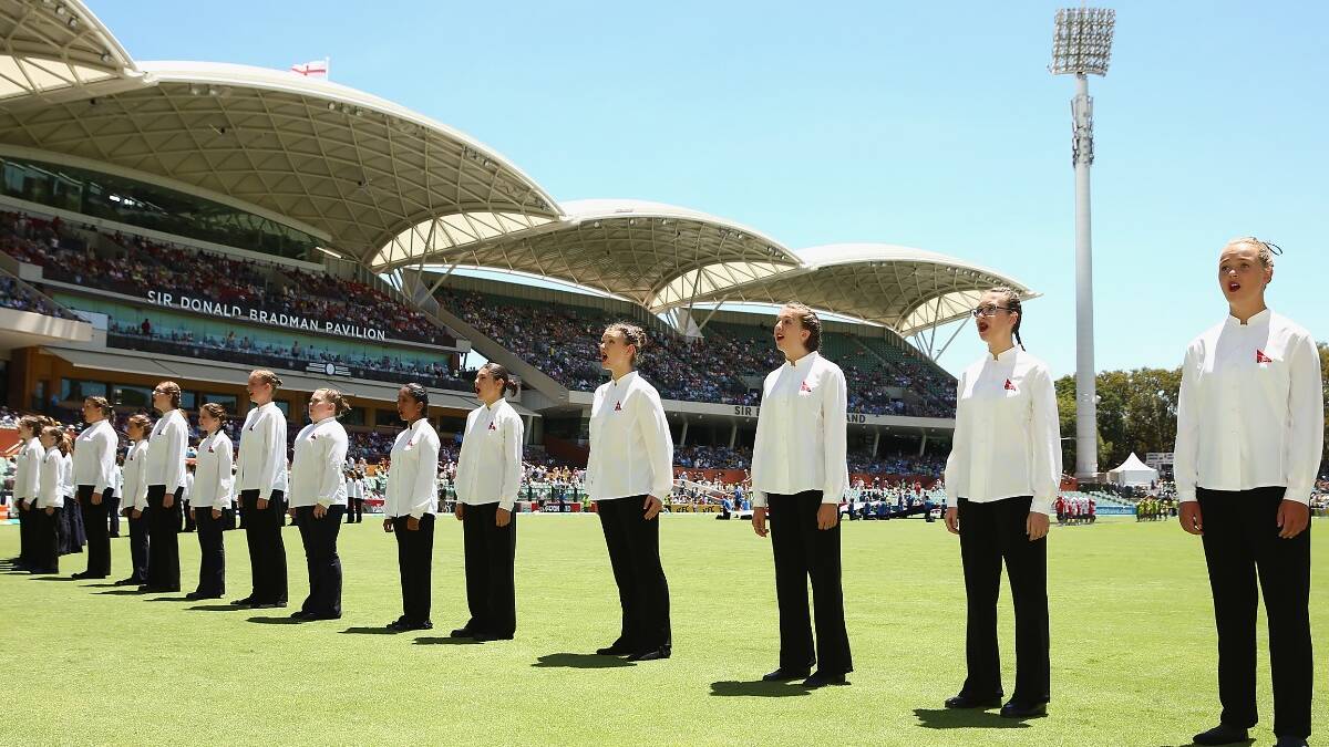 The Qantas choir sing prior game five of the One Day International Series between Australia and England at Adelaide Oval. Picture: Getty.
