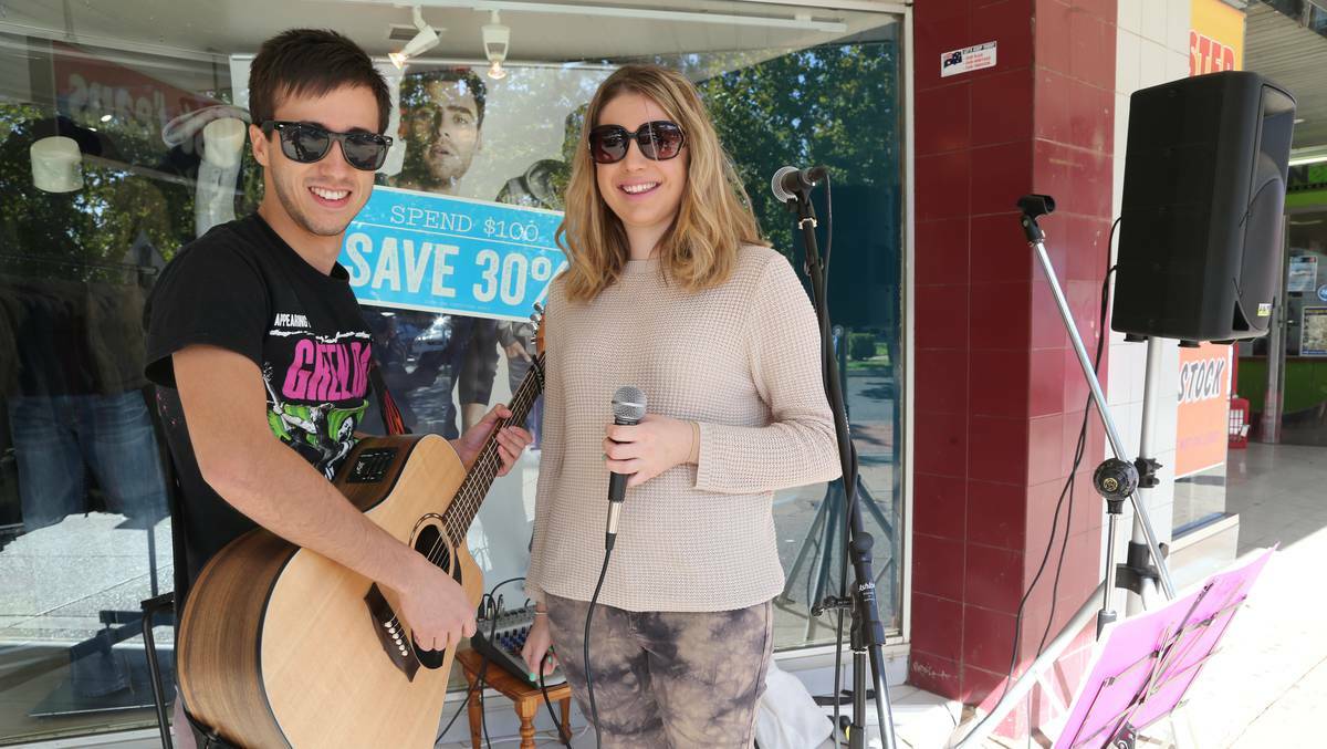 SIDE WALK SALE, GRIFFITH: Chris Rossetto and Bonnie Heffernan. Picture: Anthony Stipo, The Area News
