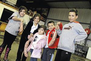 THAT TIME AGAIN: Elise Sergi, 8, Elizabeth Sergi, 6, Alana Sergi, 3, Domenic Sergi, 5, and Domenic Sergi, 8, had fun helping make salami over the long weekend in Griffith. Picture: Anthony Stipo
