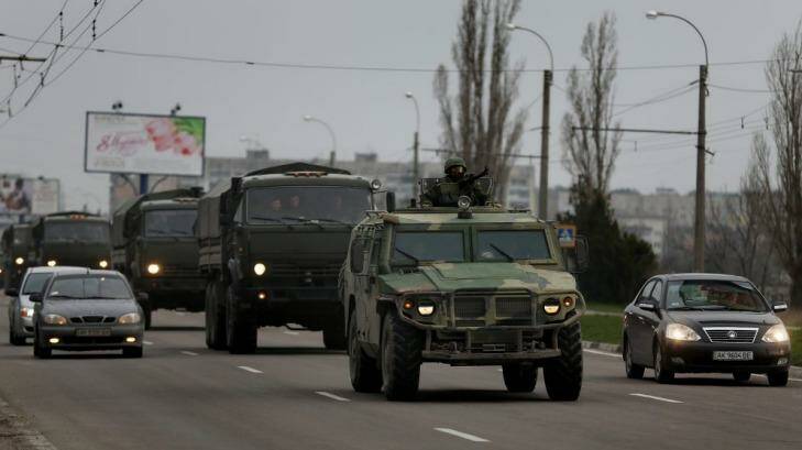 The troop convoy moves through the  streets of Simferopol. Photo: Kate Geraghty