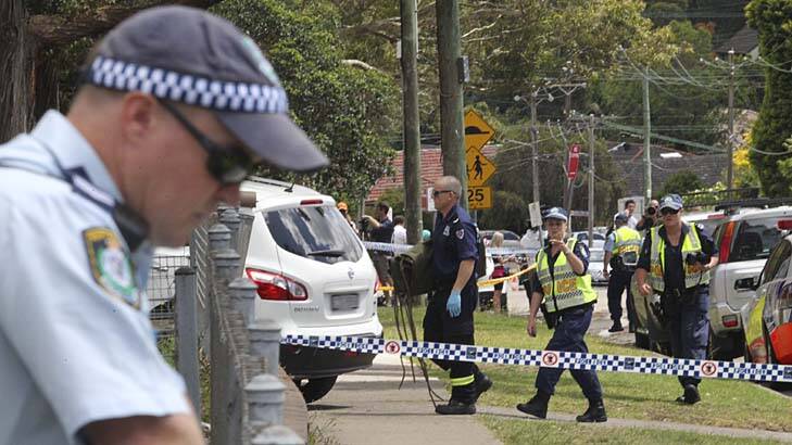 Police sealed off the area after a white four-wheel-drive was involved in a fatal crash outside Carlingford Public School. Photo: Peter Rae