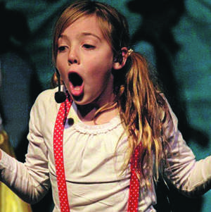 SHOWSTOPPER: Griffith Public School’s Lucy Bretherton belts out a tune as part of KROP yesterday at the Griffith Regional Theatre. 