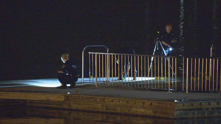 Police look for evidence at Rose Bay Wharf. Photo: Daniel Shaw