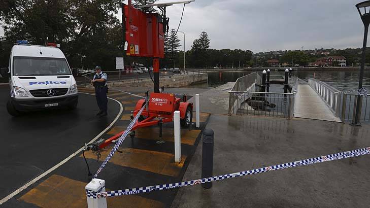 Cordoned off: shots were fired at a boat at Rose Bay Wharf. Photo: Nick Moir