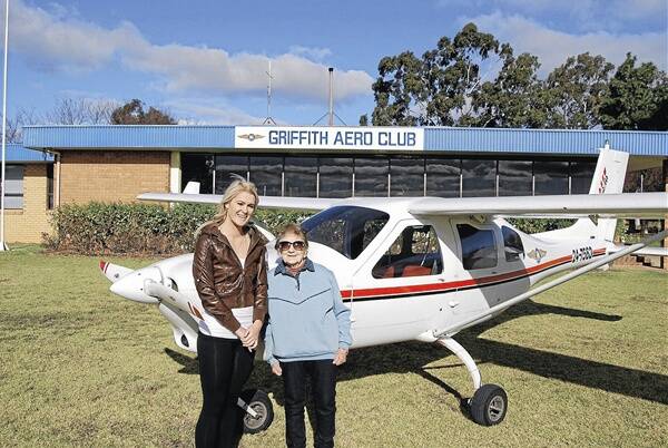 NEVER TOO OLD: Octogenarian Doreen Taylor and 21-year-old Kirsty Finn prove age is no barrier when flying a plane.