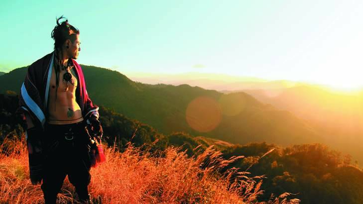Wild at heart … Augustine Shimray, a member of the Tangkhul tribe, on Shirui Peak at sunset. Photo: Wren Raleng