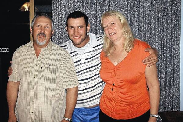 LOVING FAMILY: The late Ben Catanzariti (middle) in a recent photo with parents Barney and Kay Catanzariti. The 21-year-old concreter was tragically killed in a freak workplace accident in Canberra on Saturday morning.