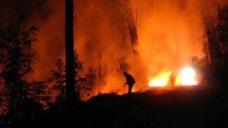 Firefighter battles a blaze alone. Photo: Environment East Gippsland Facebook page