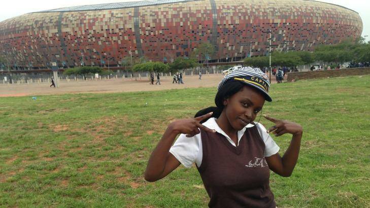 Gift of employment ... Nondumiso Ndzamela, 23, is one of thousands of South African's who will work at Nelson Mandela's memorial at Soweto's FNB Stadium.