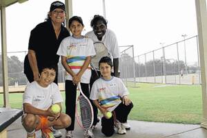 IN GOOD COMPANY: Australian tennis icon Evonne Goolagong-Cawley poses with (back) Lanisha Davis 8, coach Tarlina Tipungwuti (front) Steve Collins, 10, and Jye Collins, 8. Picture: Anthony Stipo