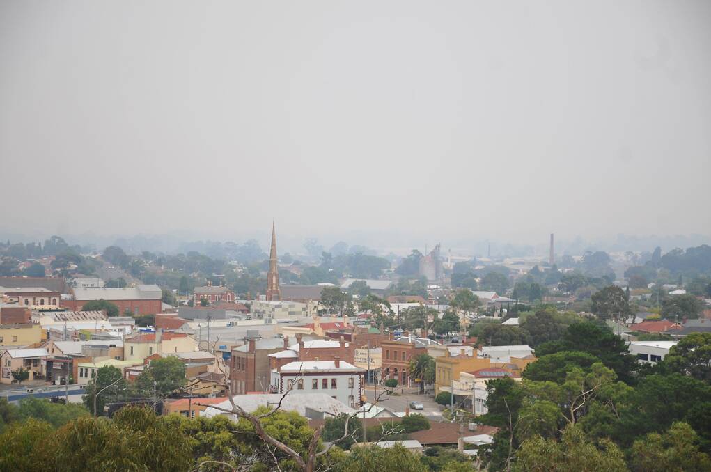Late Friday smoke smothered the town of Stawell. Pictures: BEN KIMBER.