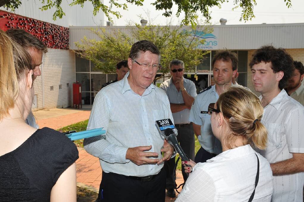 Mr Napthine addresses the media outside the relief centre in Stawell.