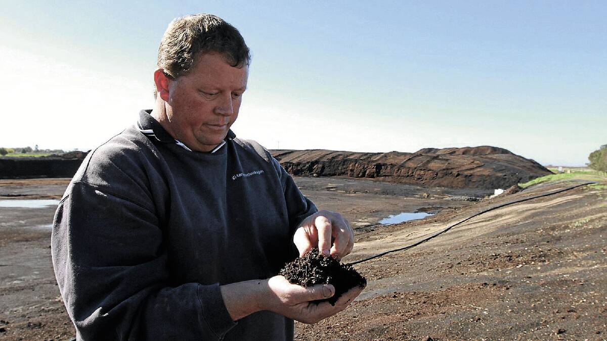 MAKING A MARC: Tarac Techologies site supervisor Scott Blenkiron is gifting local farmers free feed and soil conditioner to help reduce their colossal pile of grape marc at Beelbangera.