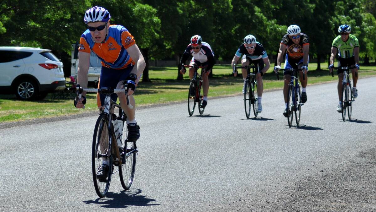 HOME STRETCH: A peloton of Griffith Cycle Club riders head for the finish line on Sunday.