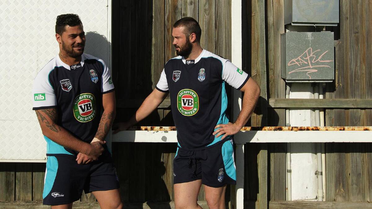 Andrew Fifita ... with fellow Blue Aaron Woods just before a training session prior to Origin II. Picture: Kate Geraghty