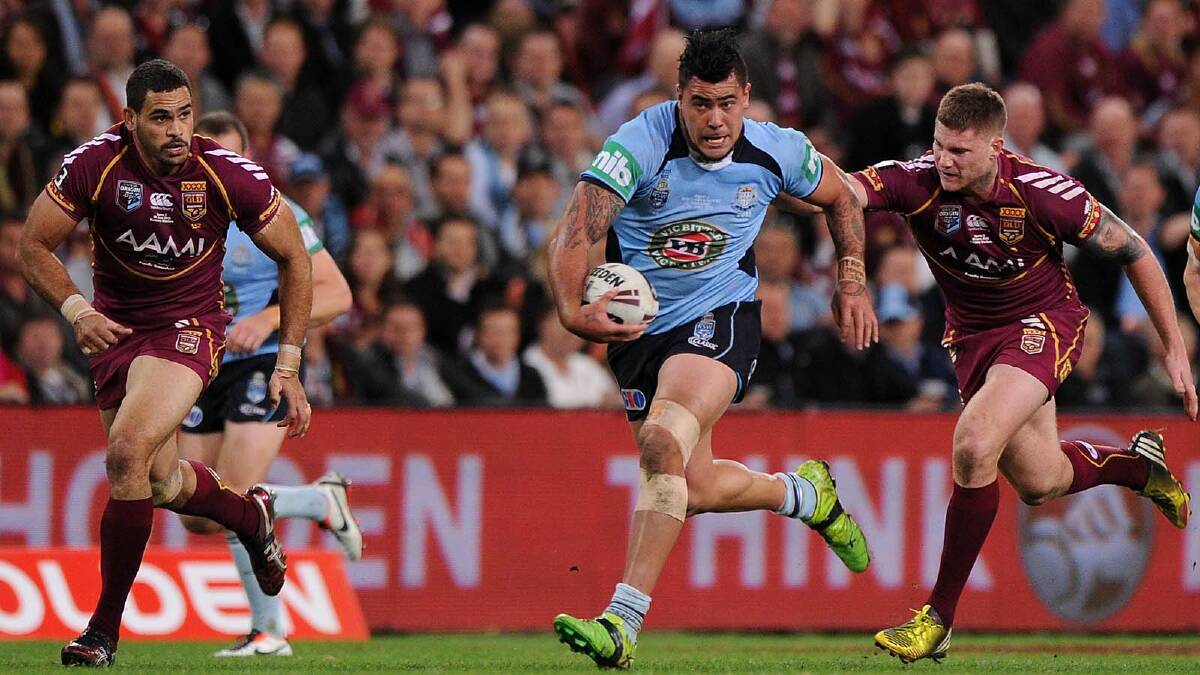 Andrew Fifita ... has Maroons hot on his heels during game two of the 2013 State of Origin series. Picture: Getty Images