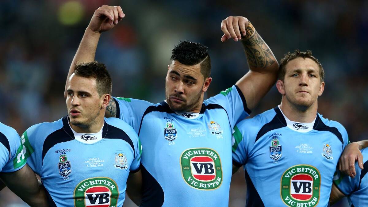 Andrew Fifita ... flanked by Joshy Reynolds and Ryan Hoffman during the national anthem at Origin I. Picture: Getty Images